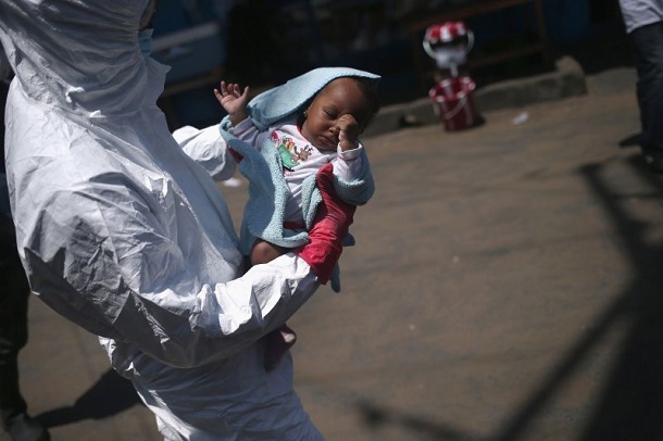  Американский фотокорреспондент рассказал о своей работе в охваченной вирусом Эбола Либерии